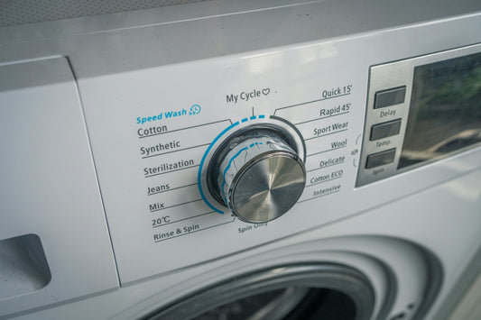 Modern front load washer with multiple cycle settings, ideal for energy-efficient laundry solutions in Canadian homes. Perfect for shoppers exploring high-quality laundry appliances.