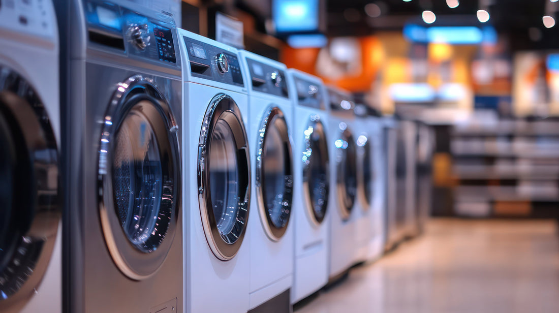 Row of modern washing machines displayed in an appliance store. Compare the best-rated laundry appliances and discover top brands for performance and reliability.